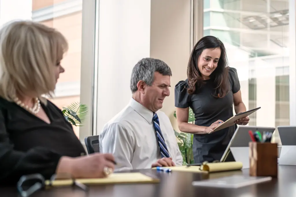 Team members in the conference room.